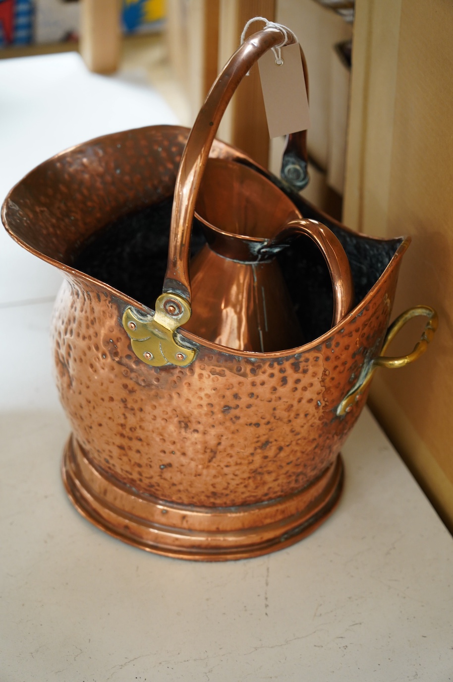 A pair of Far Eastern engraved brass rectangular trays, a copper coal scuttle and sundry metalware. Condition fair